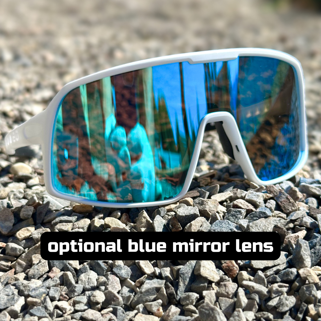 Eastern Outer Mojave sunglasses with photochromic lenses, featuring a white frame and optional blue accents in the image