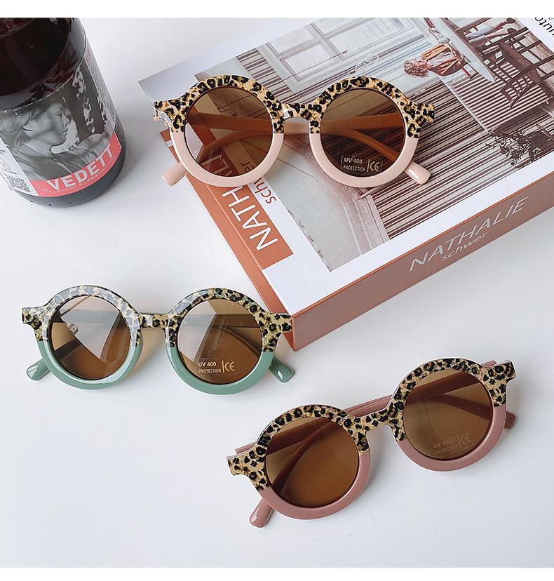 Stevvex children's sunglasses with round shape, leopard and cartoon bear designs, suitable for boys and girls.