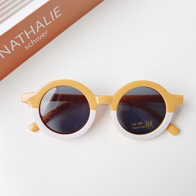 Stevvex children's sunglasses with leopard and cartoon bear shapes, round style, suitable for boys and girls.