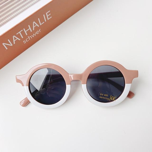 Stevvex children's sunglasses with cartoon bear and leopard prints, round shape, suitable for boys and girls, stylish and playful eyewear.
