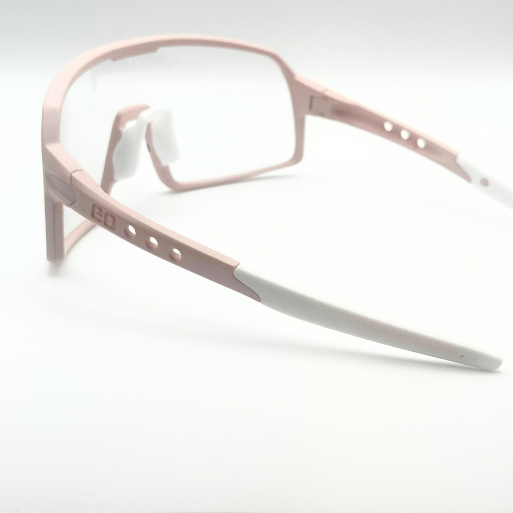 Eastern Outer Mojave sunglasses with photochromic lenses, rear angle view showing the rose-colored frame and lens details.