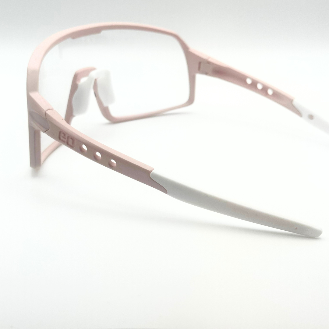 Eastern Outer Mojave sunglasses with photochromic lenses, rear angle view showing the rose-colored frame and lens details.
