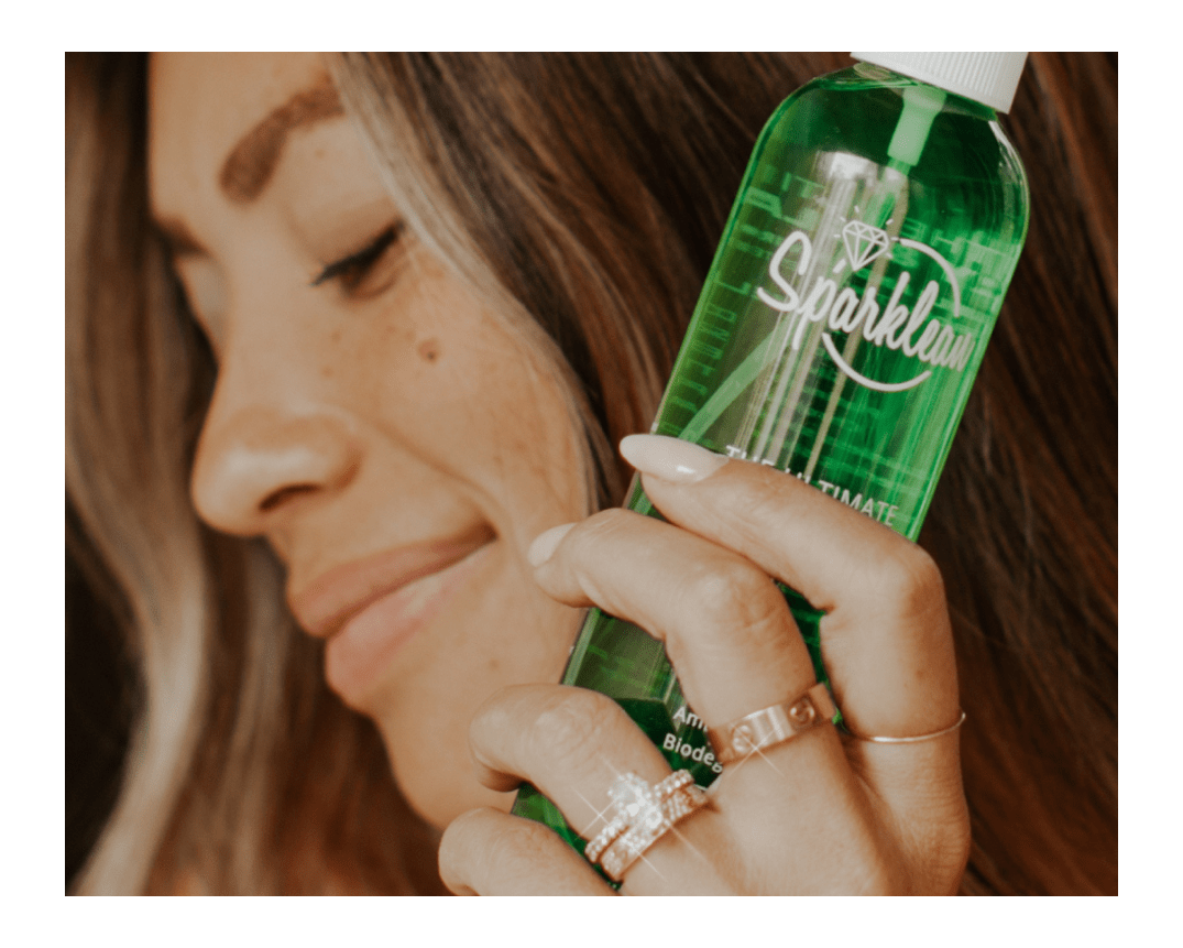 Sparklean Original Cleaning Spray for eyewear, safe for all coatings, with anti-fog properties, shown in a clear bottle with a spray nozzle.