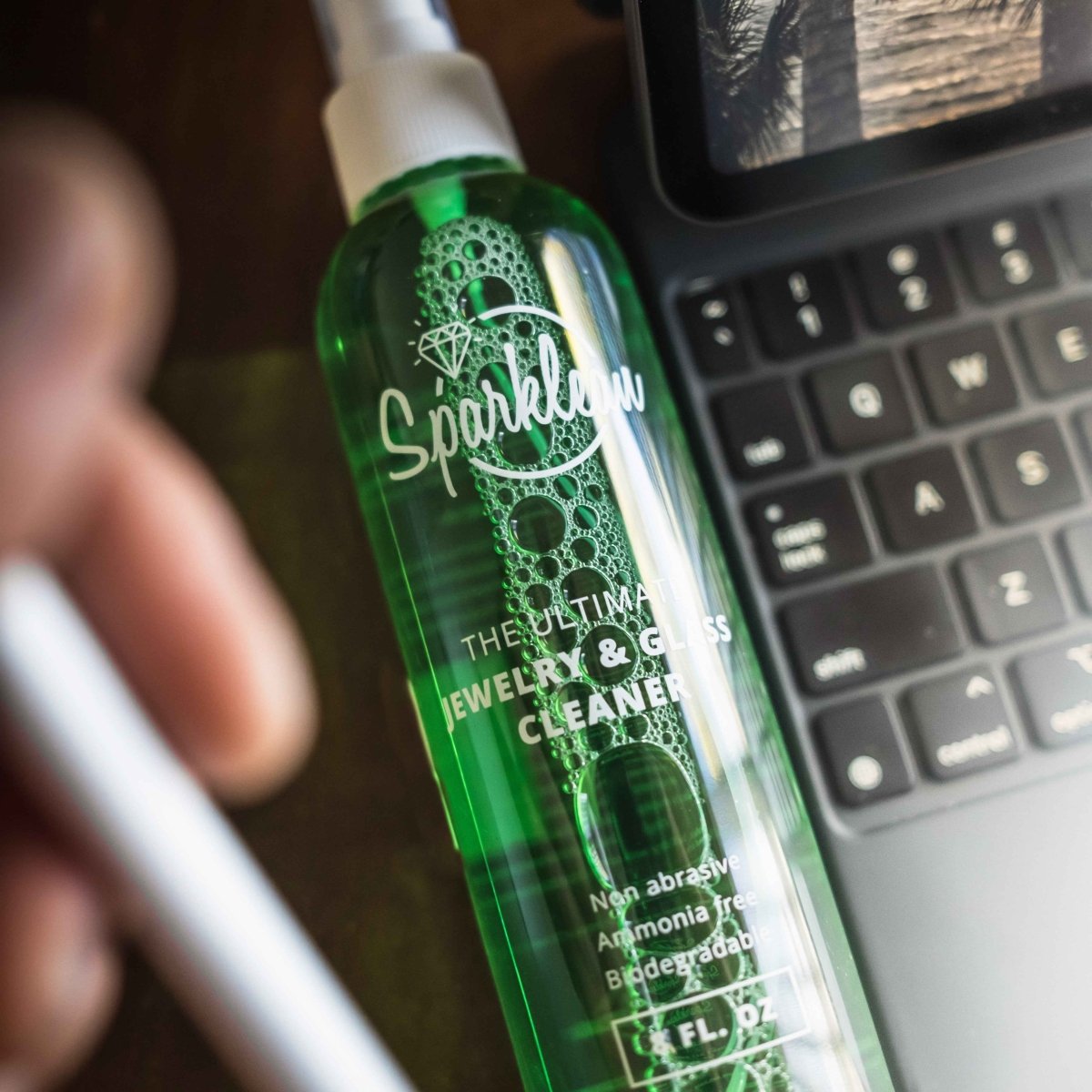 Sparklean Original Cleaning Spray for eyewear, safe for all coatings, with anti-fog formula, shown in a clear spray bottle.
