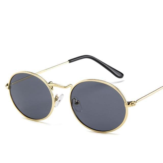 Vintage oval polarized sunglasses for women by Stevvex, stylish black round lenses with anti-reflective coating and luxury design.