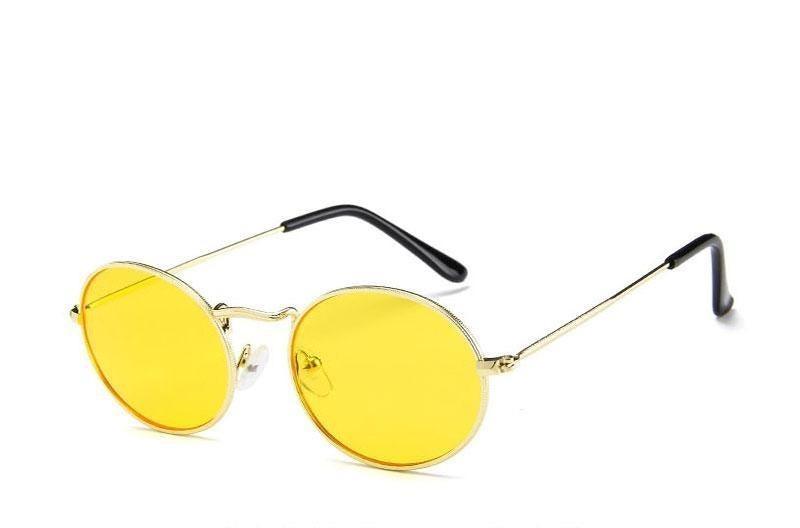 Vintage oval polarized sunglasses for women by Stevvex with round, black frames, reflective lenses, and a stylish, luxury design.