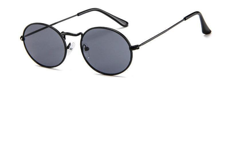 Vintage oval polarized sunglasses for women by Stevvex, stylish round design with black frame and anti-reflective lenses.