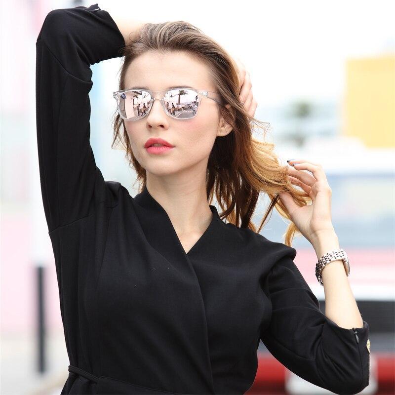 Stylish Stevvex polarized colorful sunglasses with reflective lenses, transparent frame for women and men, ideal for sun protection.