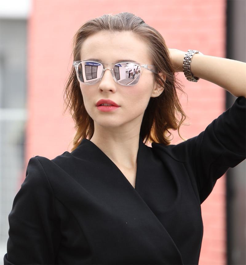 Stylish Stevvex polarized colorful sunglasses with transparent frame, reflective lenses, suitable for men and women.