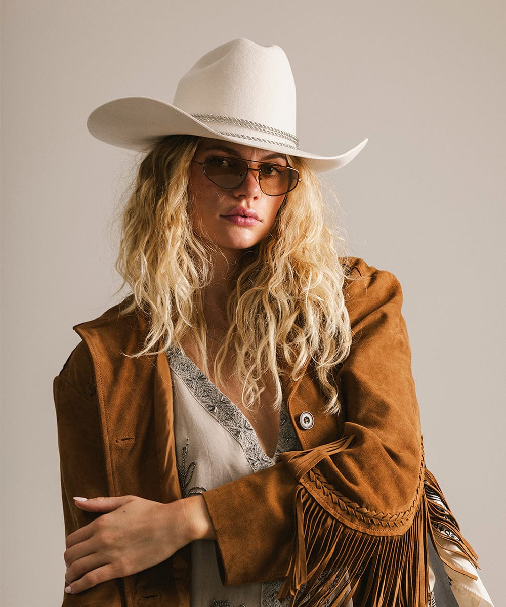 Brown Sienna aviator sunglasses by GIGI PIP featuring metal frames and tinted lenses for a stylish, classic look.