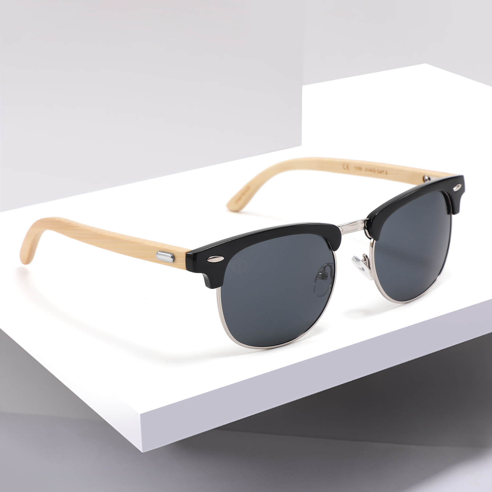 White handmade wooden Twilight Apaches sunglasses by Papago displayed on a shelf, showcasing eco-friendly, stylish eyewear.