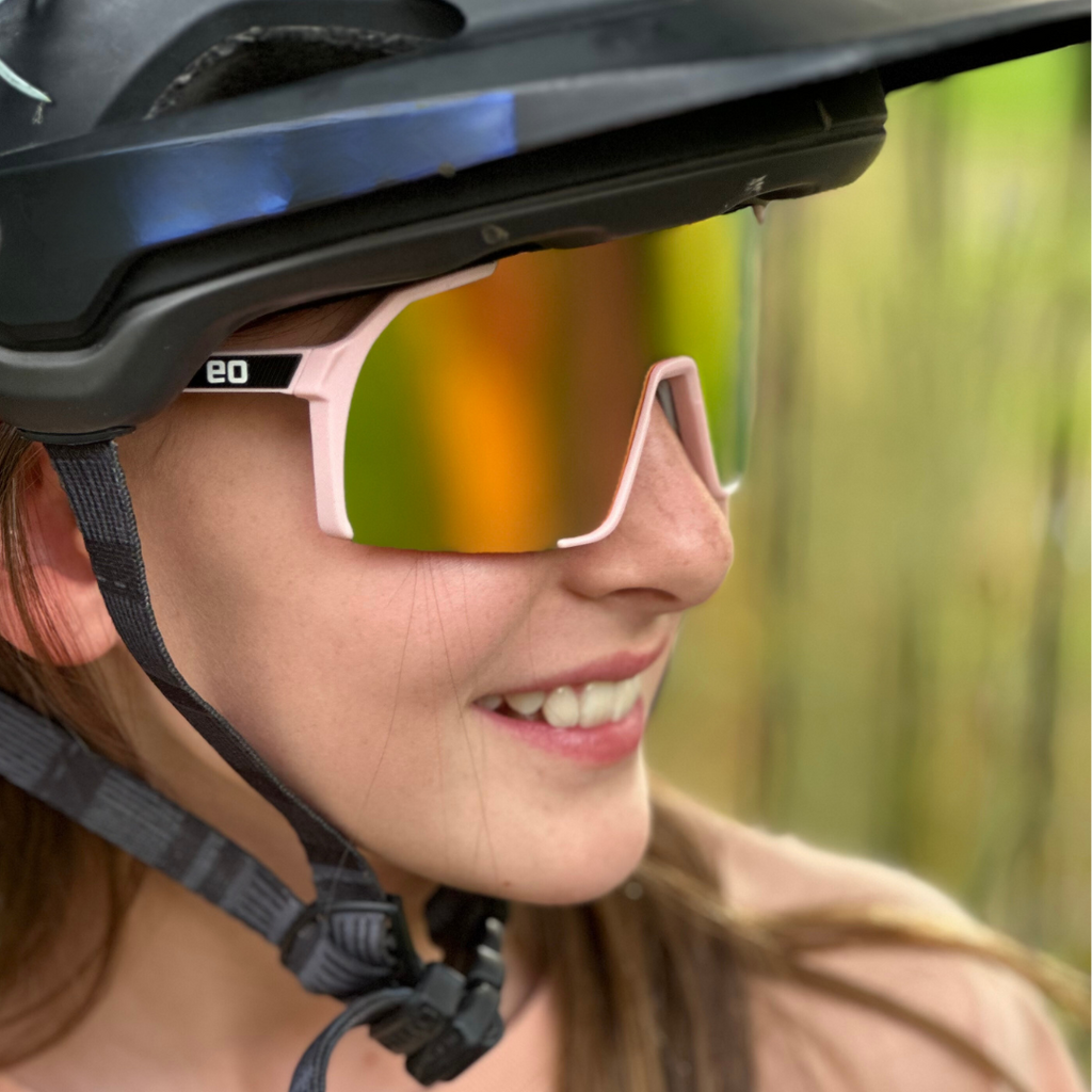 Eastern Outer Uno Mas Photochromic+ small youth sunglasses with dark lenses, shown in profile.