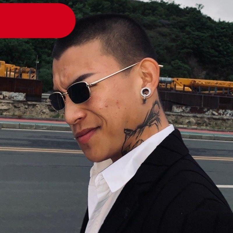 Vintage Stevvex slender square sunglasses with small metal frame, classic design, perfect for men.