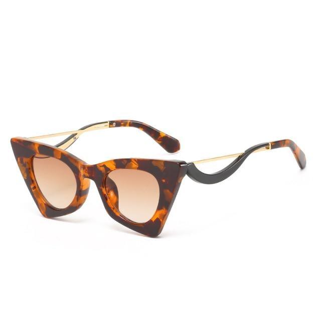 Women's vintage Stevvex cat eye sunglasses with retro square frames, stylish and trendy for a fashionable street style look.