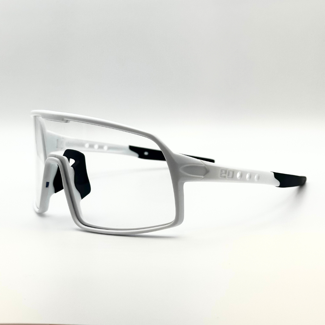 Eastern Outer Mojave sunglasses with photochromic lenses, white frame and stylish design, shown from an angled view.