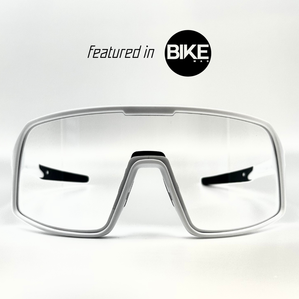 Eastern Outer Mojave sunglasses with photochromic lenses, white frame and sleek design for versatile sun protection.